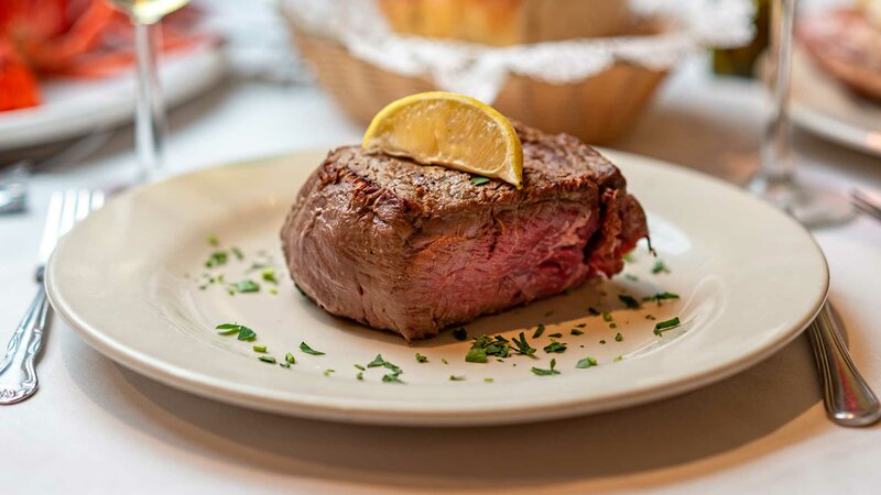 Steak entree topped with lemon