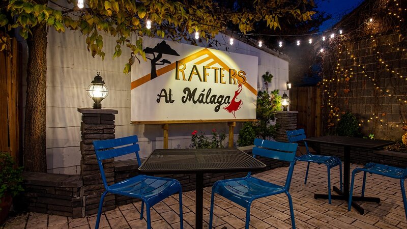 Outdoor dining area with table for two